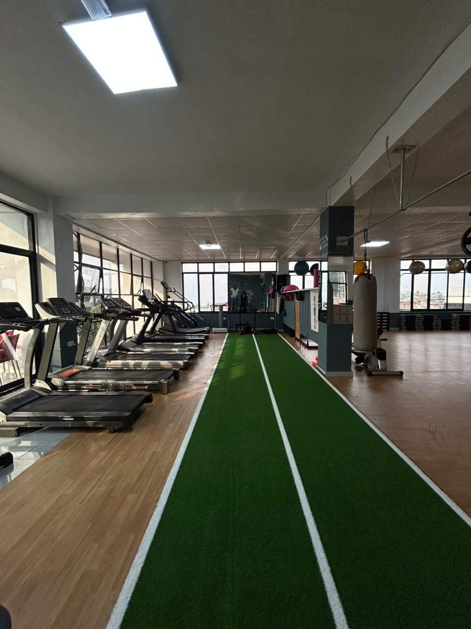 Indoor turf sprint track and cardio room